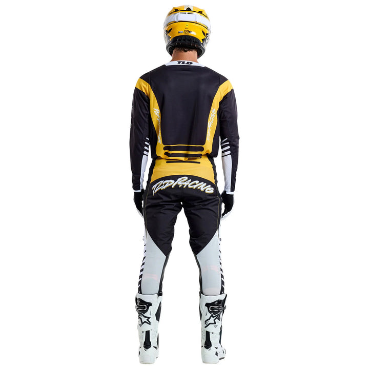 Troy Lee Designs GP Pro Fifty-50 Pants Black/Gold - Full Rear View of Model Wearing Pants