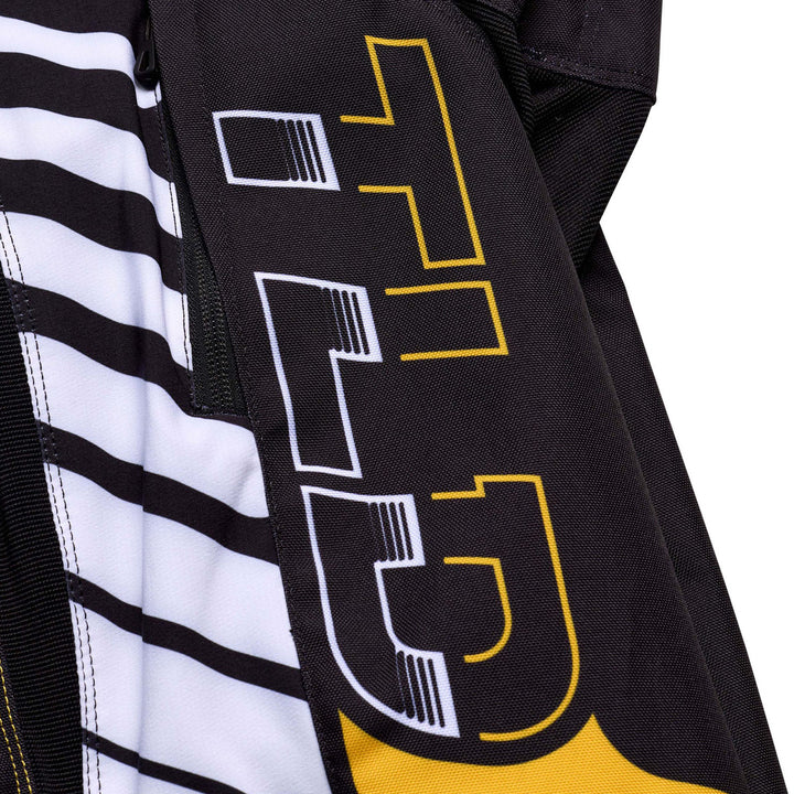 Troy Lee Designs GP Pro Fifty-50 Pants Black/Gold - Close-Up of TLD Graphic on Thigh