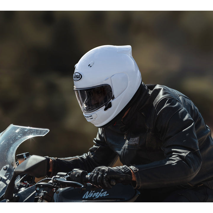 Arai Contour-X Helmet Diamond White - Lifestyle Close-up of Rider on Black Motorcycle