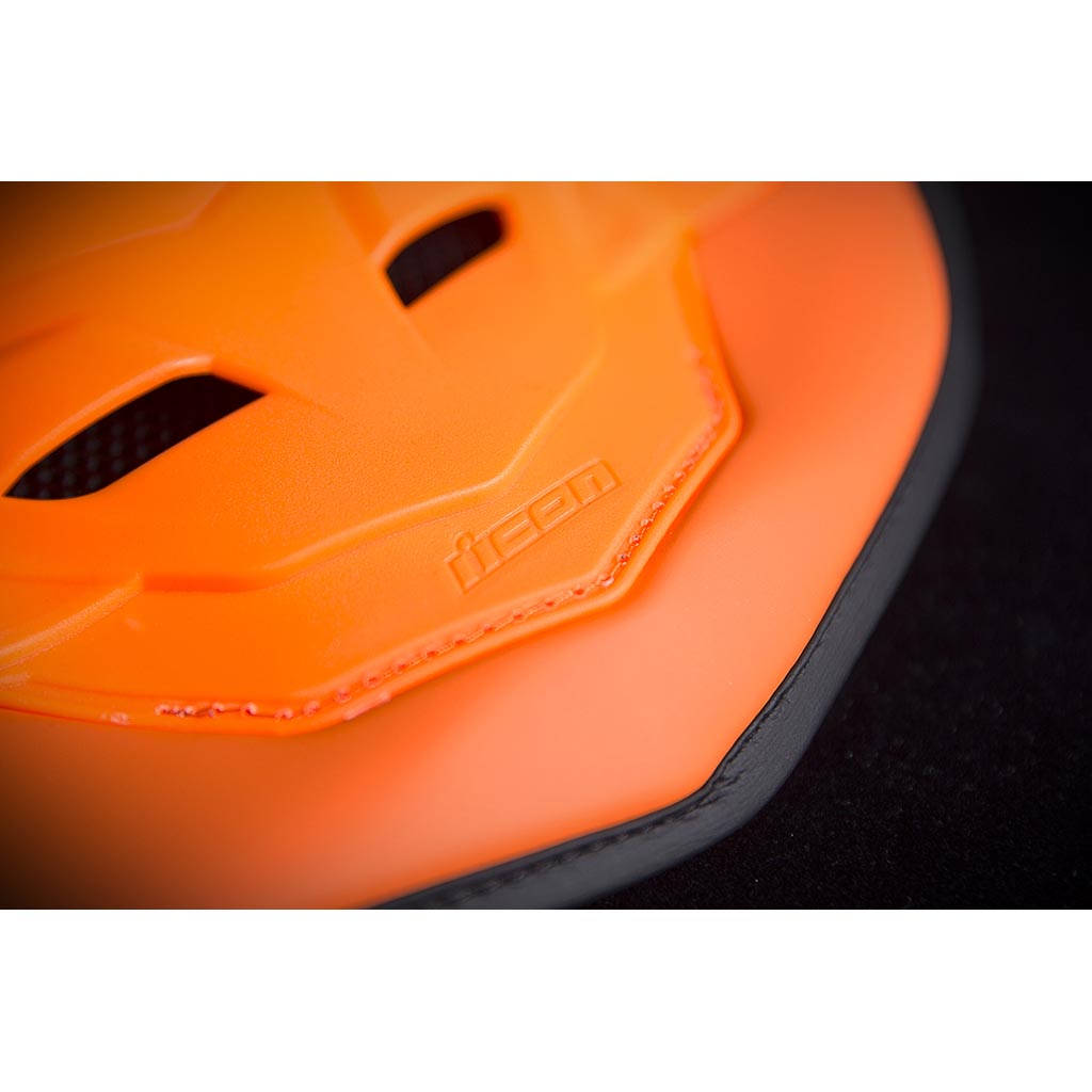 ICON Stryker Vest ORG - Close-Up of Logo on Lower Tip of Spine Plate