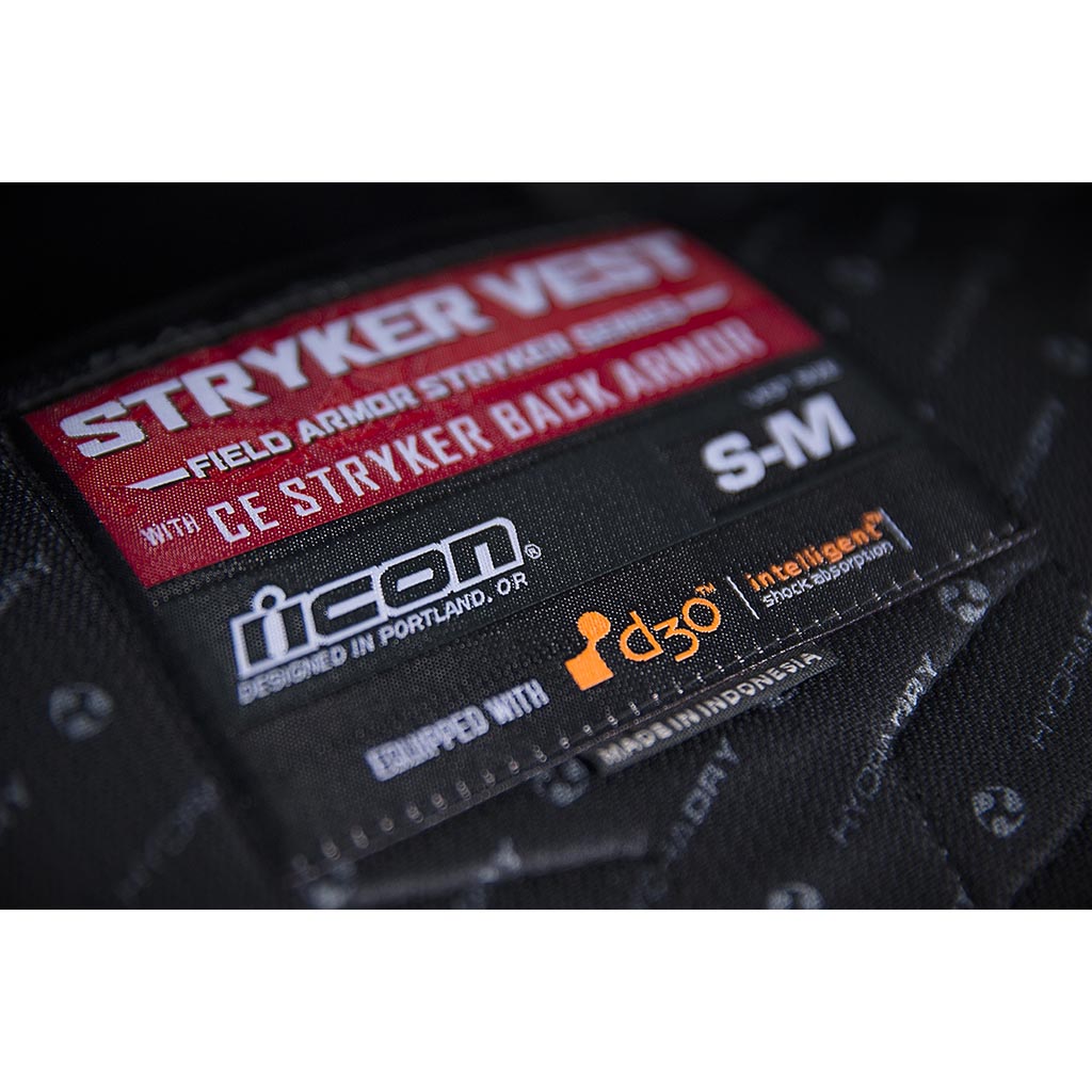 ICON Stryker Vest Red - Close-Up of Label and Size Tag