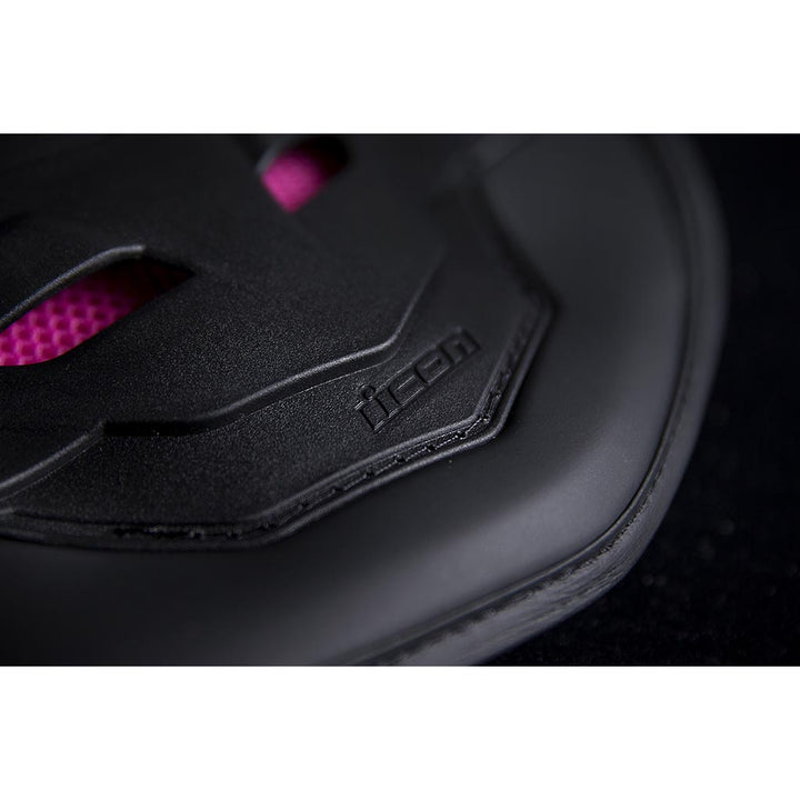 ICON Stryker Woman's Vest BLK - Close-Up of Logo on Lower Tip of Spine Plate