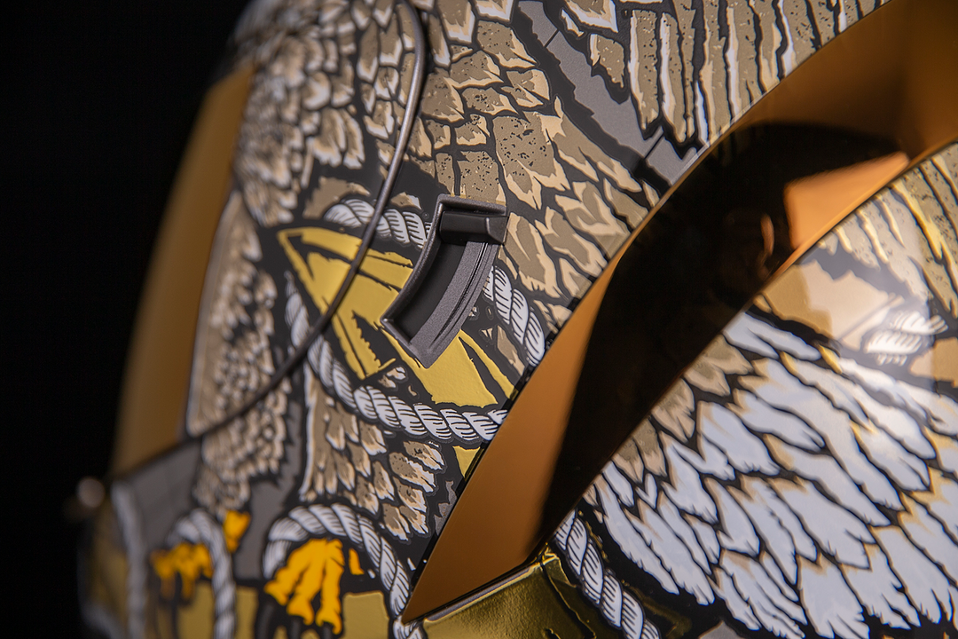 ICON Airform™ Helmet - Semper Fi - Gold - Close-Up of Drop Down Sun Visor Switch