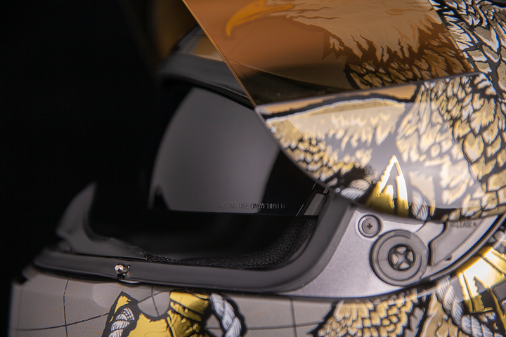 ICON Airform™ Helmet - Semper Fi - Gold - Close-up of Viewport with Faceshield Raised and Drop Down Sun Visor Lowered