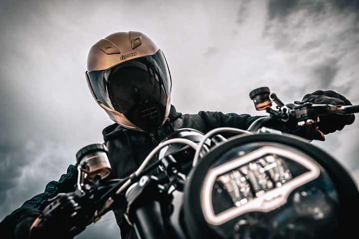 ICON Airflite Jewel MIPS Full Face Motorcycle Helmet Gold - Lifestyle of Rider Wearing Helmet while on motorcycle