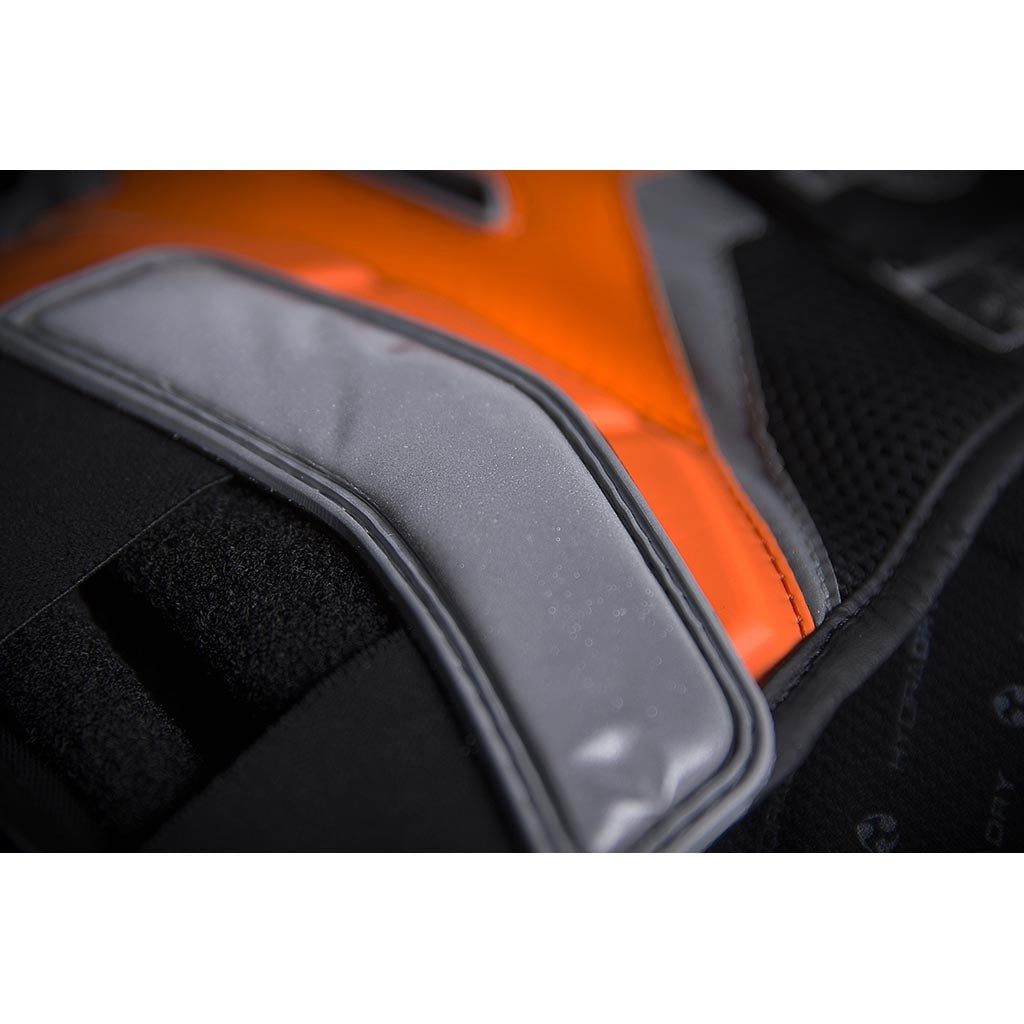 ICON Stryker Vest ORG - Close-up of Side Velcro Strap