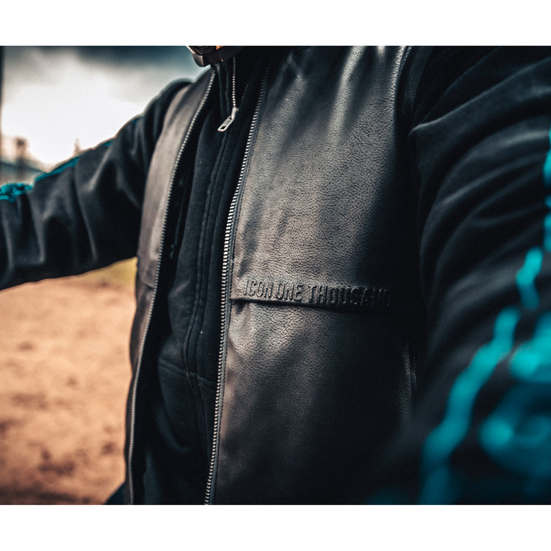 ICON Backlot Vest Black - Lifestyle Close-UP of Imprinted Logo on Chest