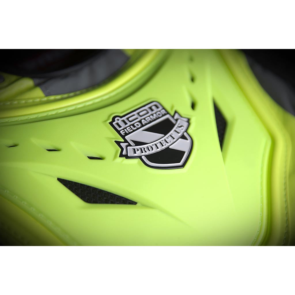 ICON Stryker Vest Yel - Close-Up of Logo on Chest Plate