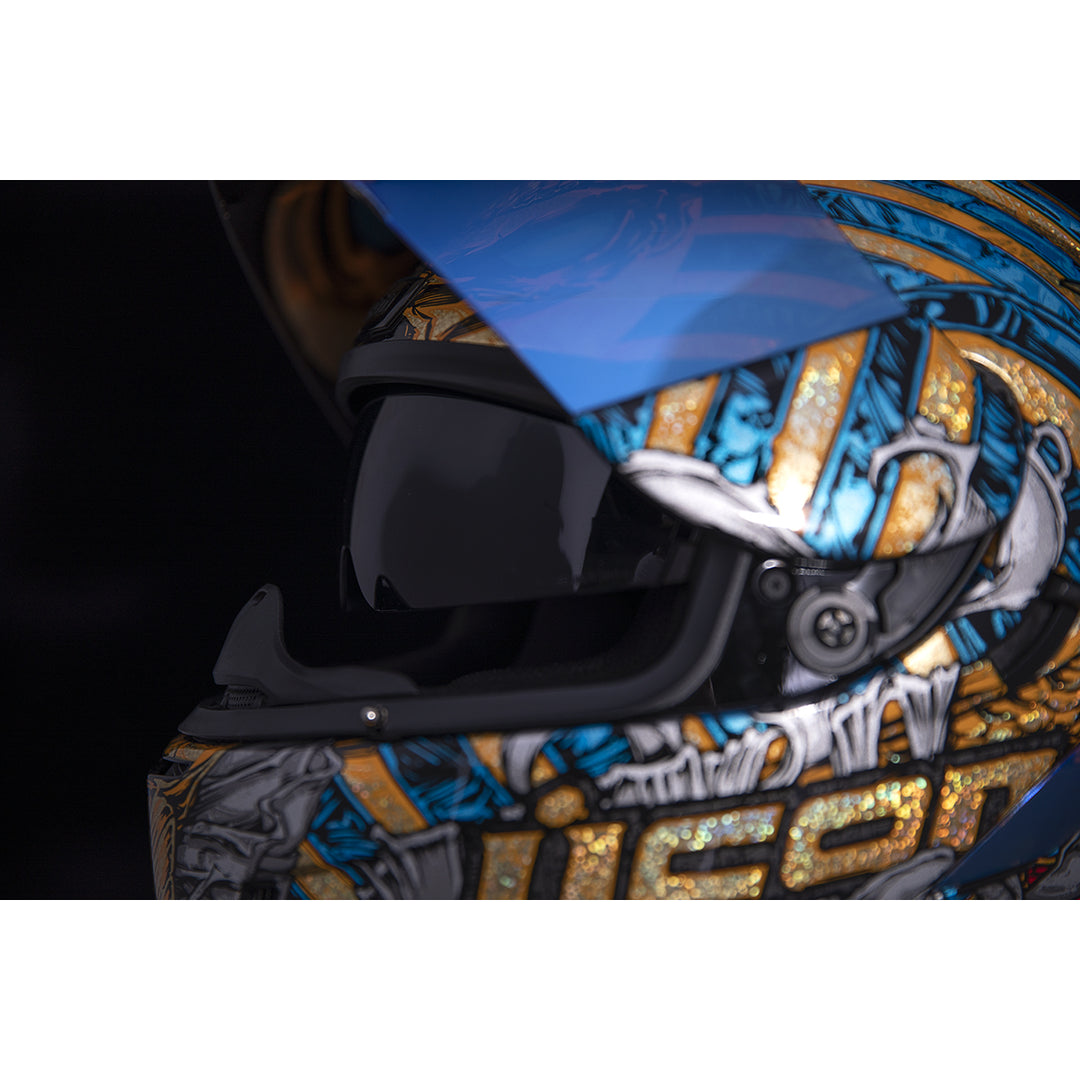 ICON Airform™ Pharaoh Helmet Gold - Close-Up of Viewport with Faceshield Raised and Drop Down Sun Visor Lowered