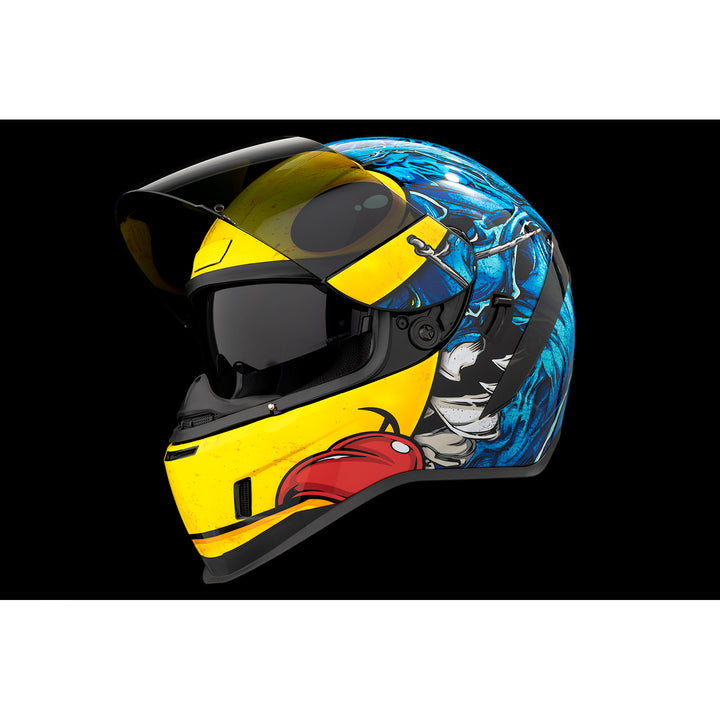ICON Airform™ Brozak MIPS® Helmet Blue - Front Left Side View with Dark Studio Background, Faceshield Raised, and Drop Down Sun Visor Lowered