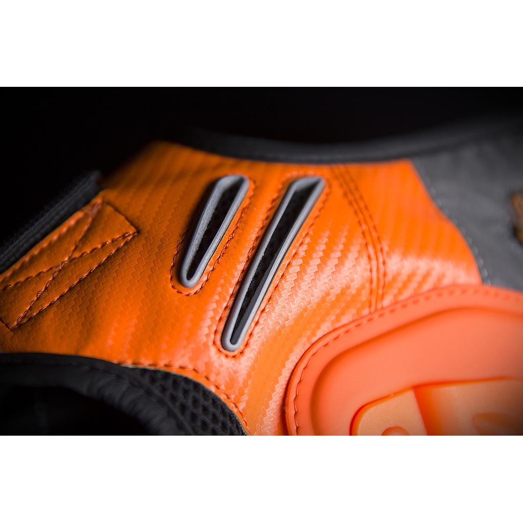 ICON Stryker Vest ORG - Close-Up of Rear Shoulder Vents