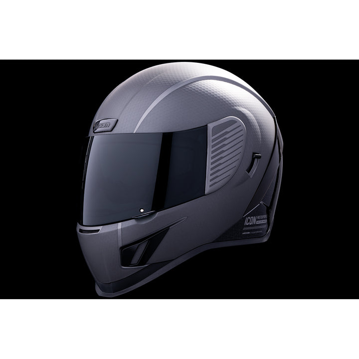 ICON Airform™ Counterstrike MIPS® Helmet Silver - Front Left Side View with Dark Studio Background