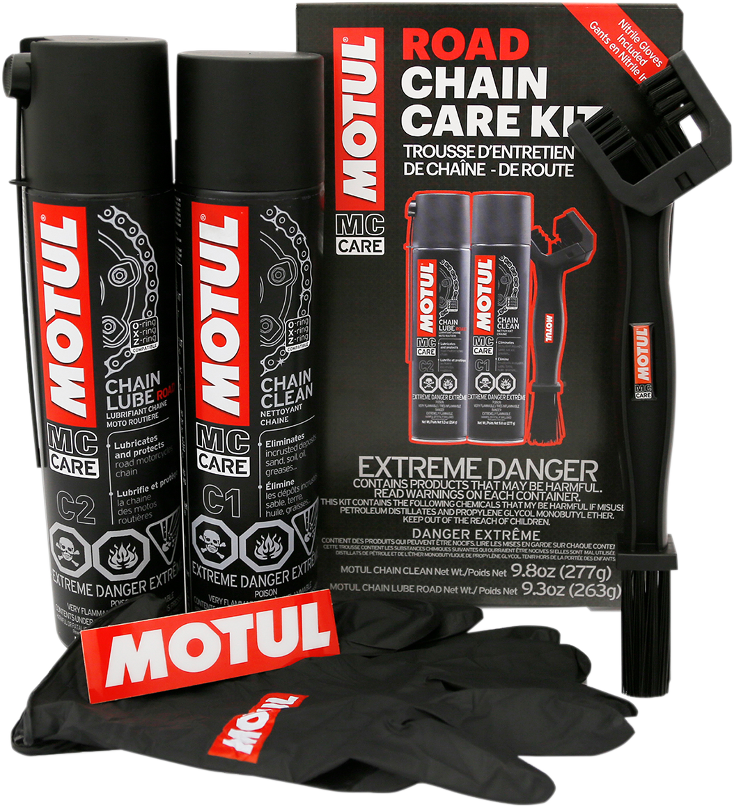 MOTUL Chain Care Kit - Road - Front View of Box Case with contents staged around it: Chain Lube, Chain Cleaner, Cleaner Gloves, Chain Brush