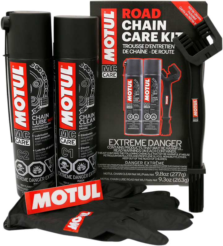 MOTUL Chain Care Kit - Road - Front View of Box Case with contents staged around it: Chain Lube, Chain Cleaner, Cleaner Gloves, Chain Brush