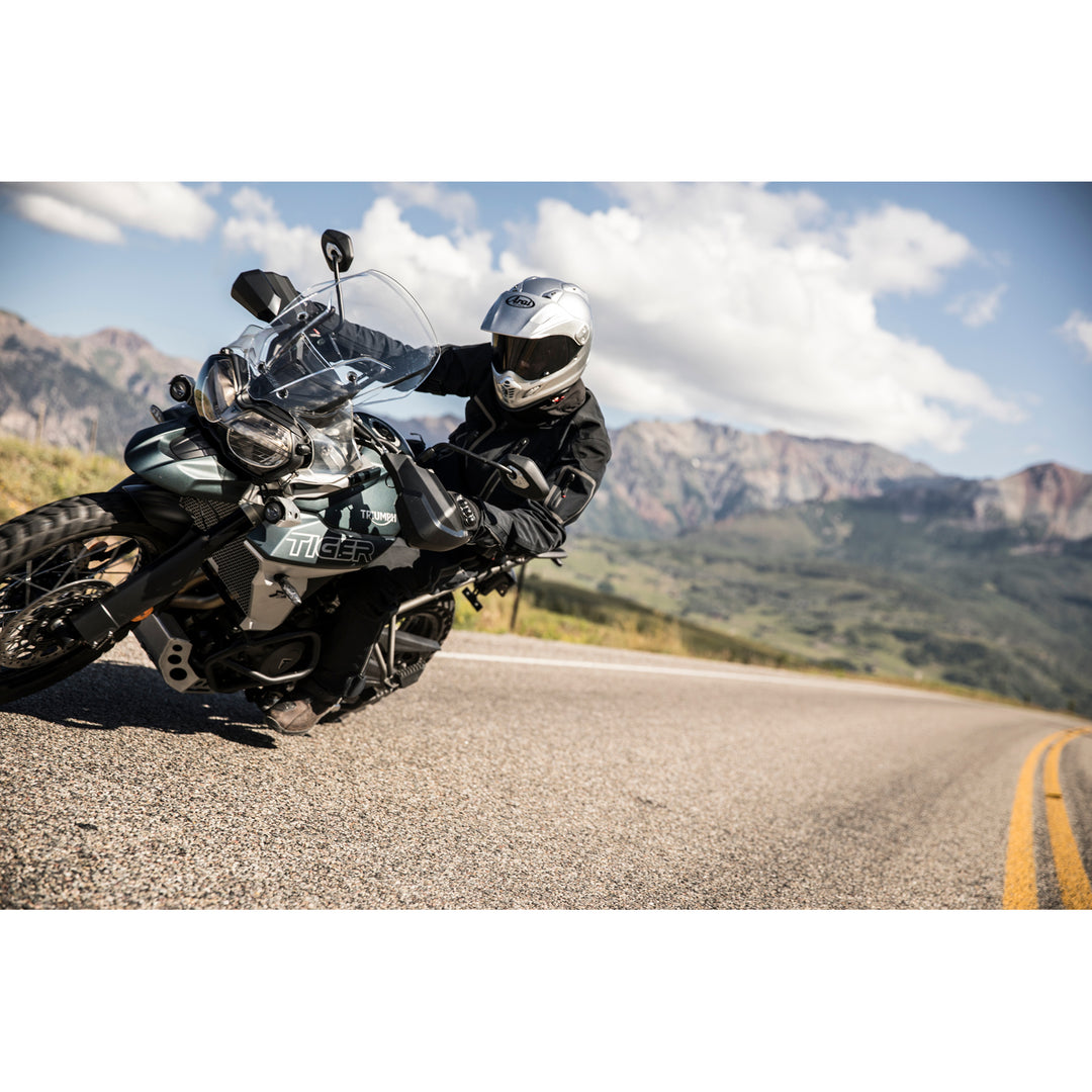 Arai XD-4 Solid Helmet Aluminum Silver - Lifestyle Shot of Rider in helmet on adventure motorcycle