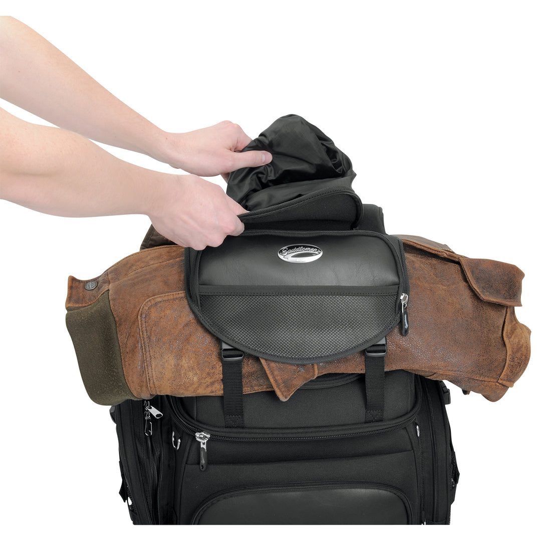 SADDLEMEN BR3400 Backseat or Sissy Bar Bag - Front View of Model Pulling Out Rain Cover