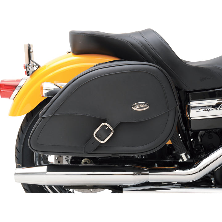 SADDLEMEN Drifter Teardrop Saddlebags with Shock Cutaway - Side View Attached to Yellow Motorcycle