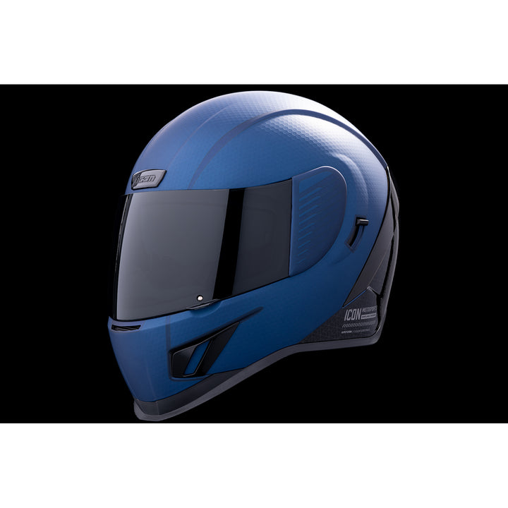 ICON Airform™ Counterstrike MIPS® Helmet Blue - Front Left Side View with Dark Studio Background