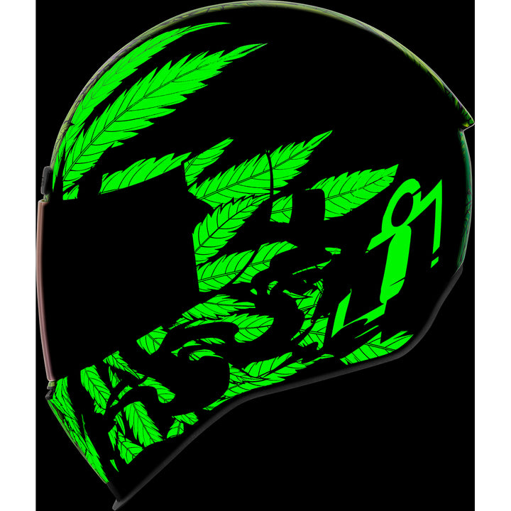 ICON Airform™ Ritemind Glow™ Helmet Green - Left Side View with Dark Studio Background and Glow-in-the-Dark Graphics