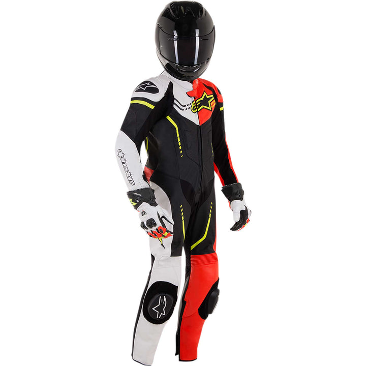 Alpinestars Youth GP Plus 1-Piece Leather Suit Black/White/Red/Yellow - Front Side View of Model Posing in Suit