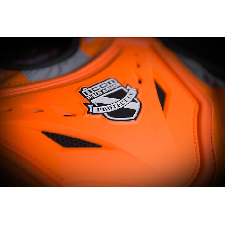 ICON Stryker Vest ORG - Close-Up of Logo on Chest Plate