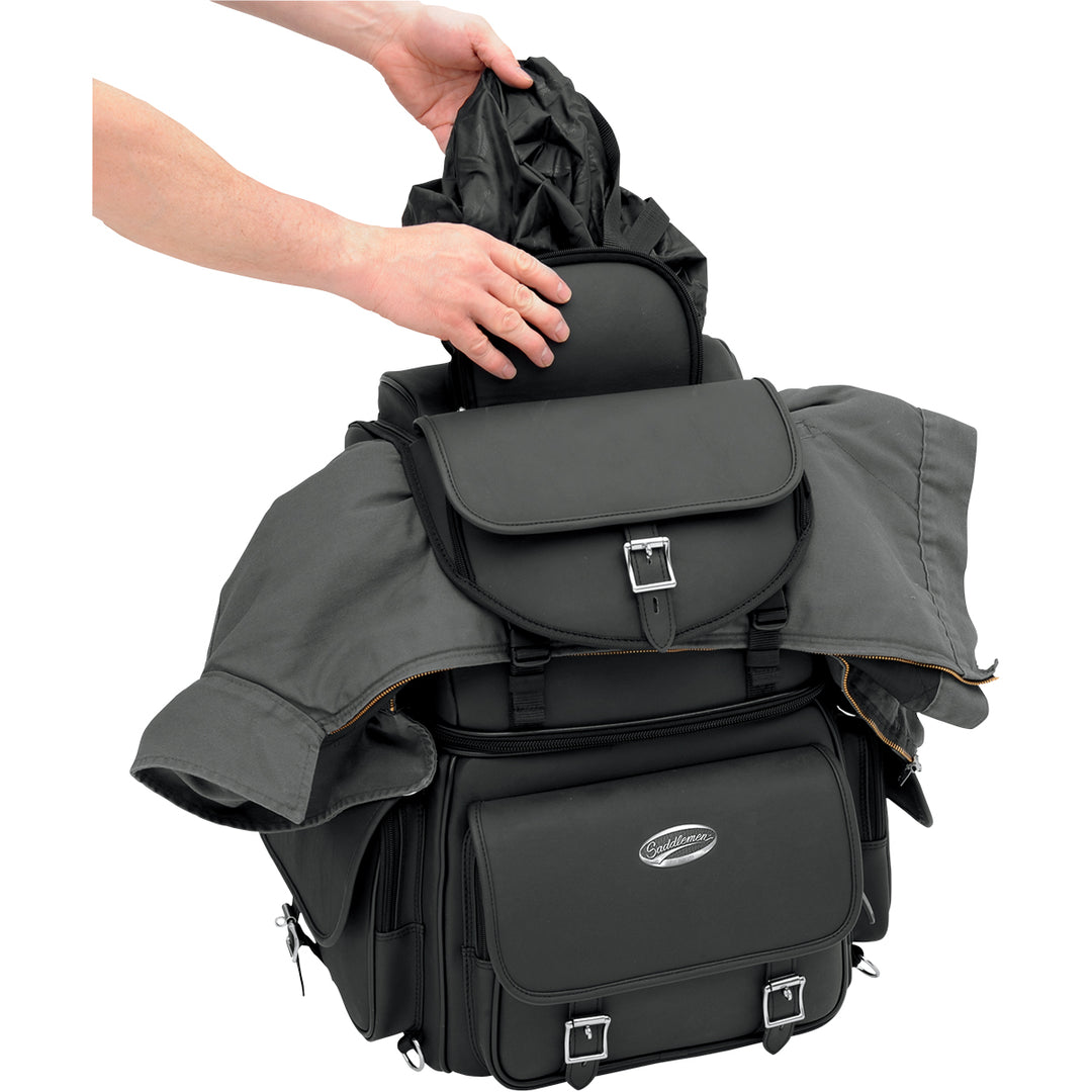 SADDLEMEN BR3400EX Combination Backrest, Backseat, and Sissy Bar Bag - Front Side View with Model Pulling Out Rain Cover