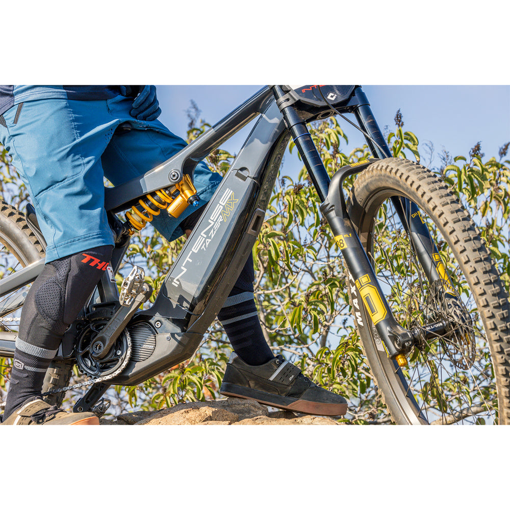 THOR Comp XP Knee Guards Black - Lifestyle Close-up of Rider Wearing Knee Guards