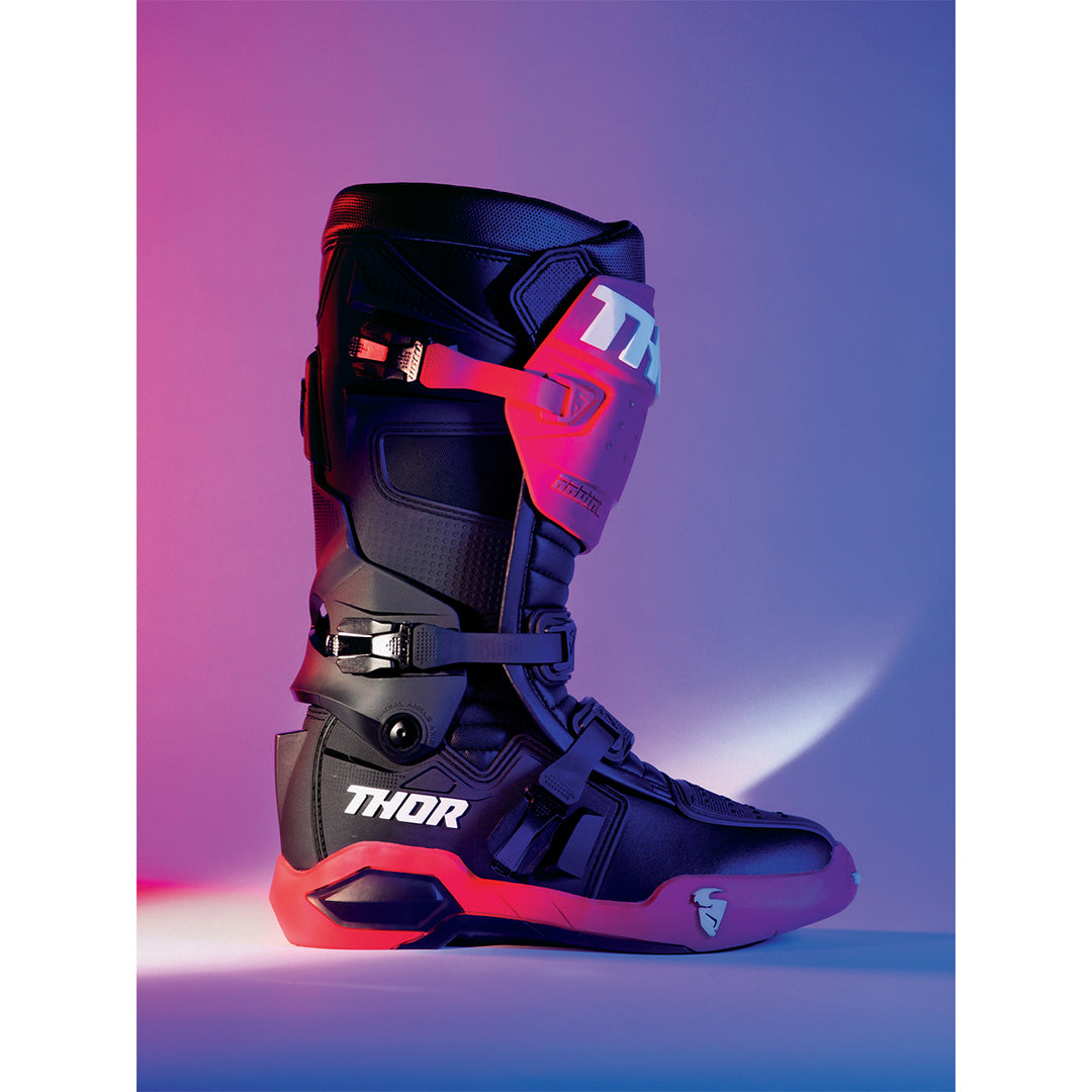 THOR Radial MX Boots Red/Black - Outer Side View in Stylized Studio Lighting