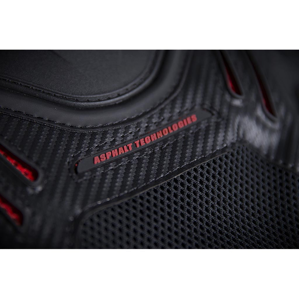 ICON Stryker Vest Red - Close-Up of "Asphalt Technologies" Graphic Under Chest Plate