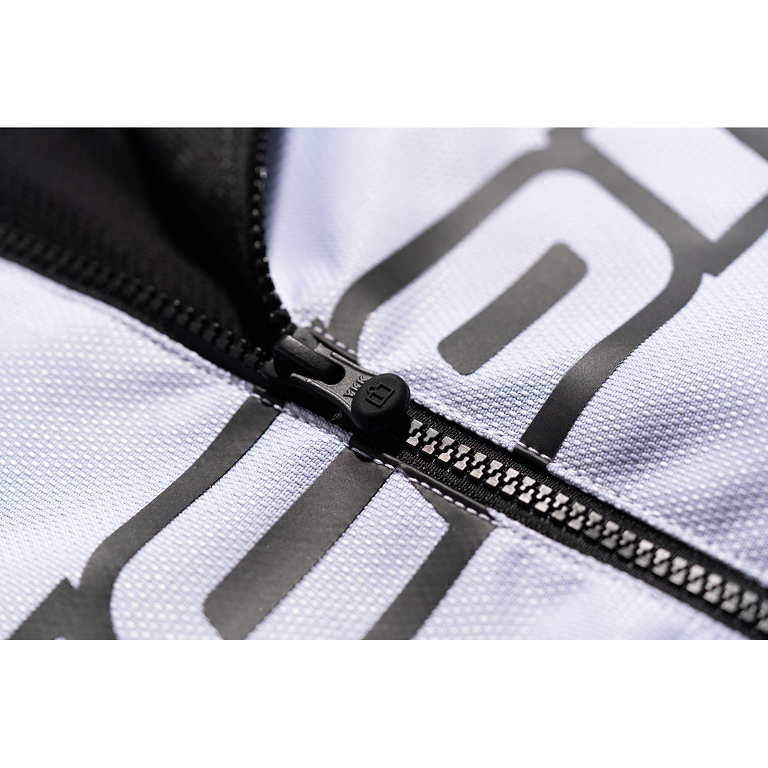 ICON Hooligan™ CE Jacket White - Close-Up of Partially Unzipped Front Zipper