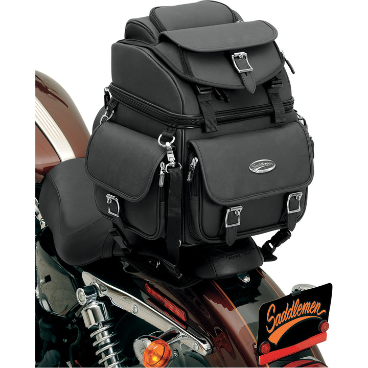 SADDLEMEN BR1800EX Combination Backrest, Seat, and Sissy Bar Bag - Angled Side View of Bag Attached to Tail of Motorcycle