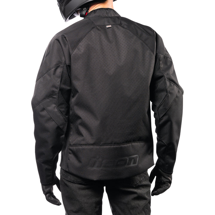 ICON Hooligan™ CE Jacket Black - Rear View of Model Posing in Jacket