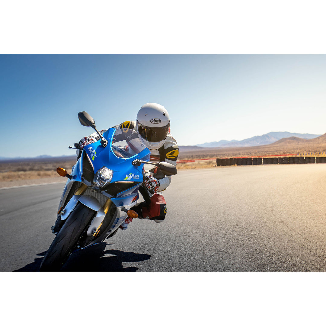 Arai Contour-X Helmet Diamond White - Lifestyle Head-On Shot of Rider on Blue Motorcycle