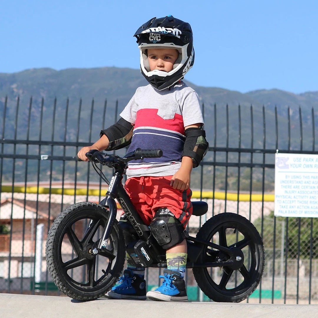 Stacyc Electric Bikes Stacyc 16EDRIVE Brushless - Lifestyle of Youth Rider Ready to Go Down Skate Park Ramp on Bike