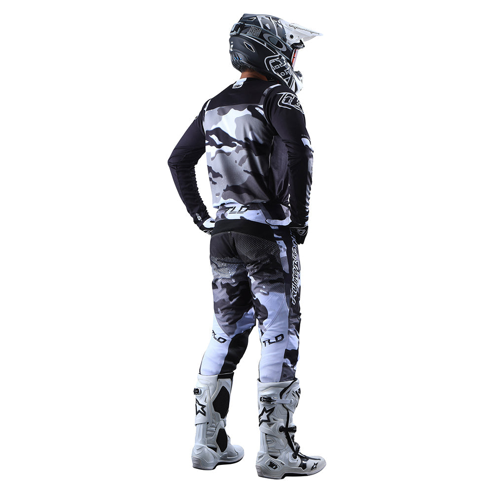 Troy Lee Designs GP Jersey Brazen Camo Gray - Rear Full View of Model Posing in Jersey and Pants