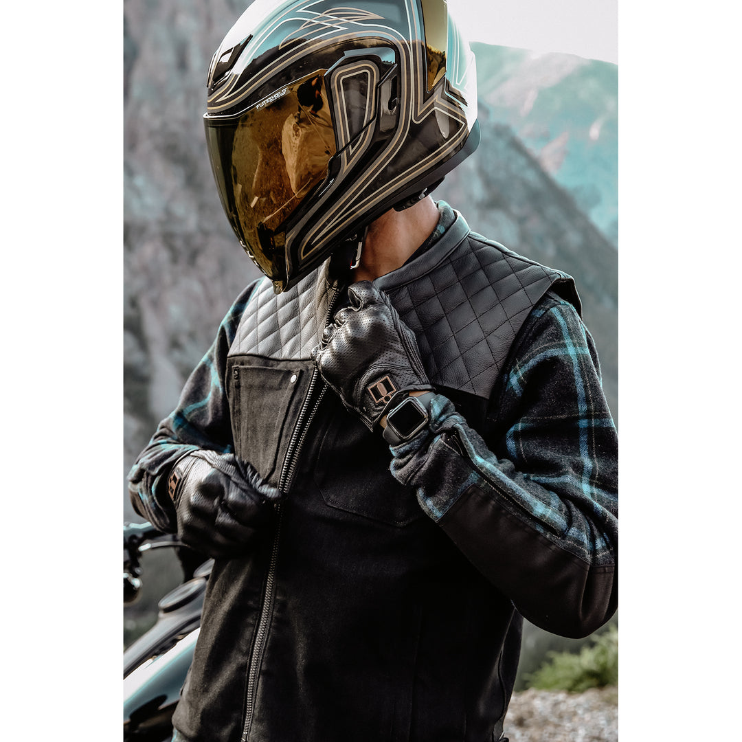 ICON Chamonix Denim Vest Black - Lifestyle of Rider Zipping Up Vest