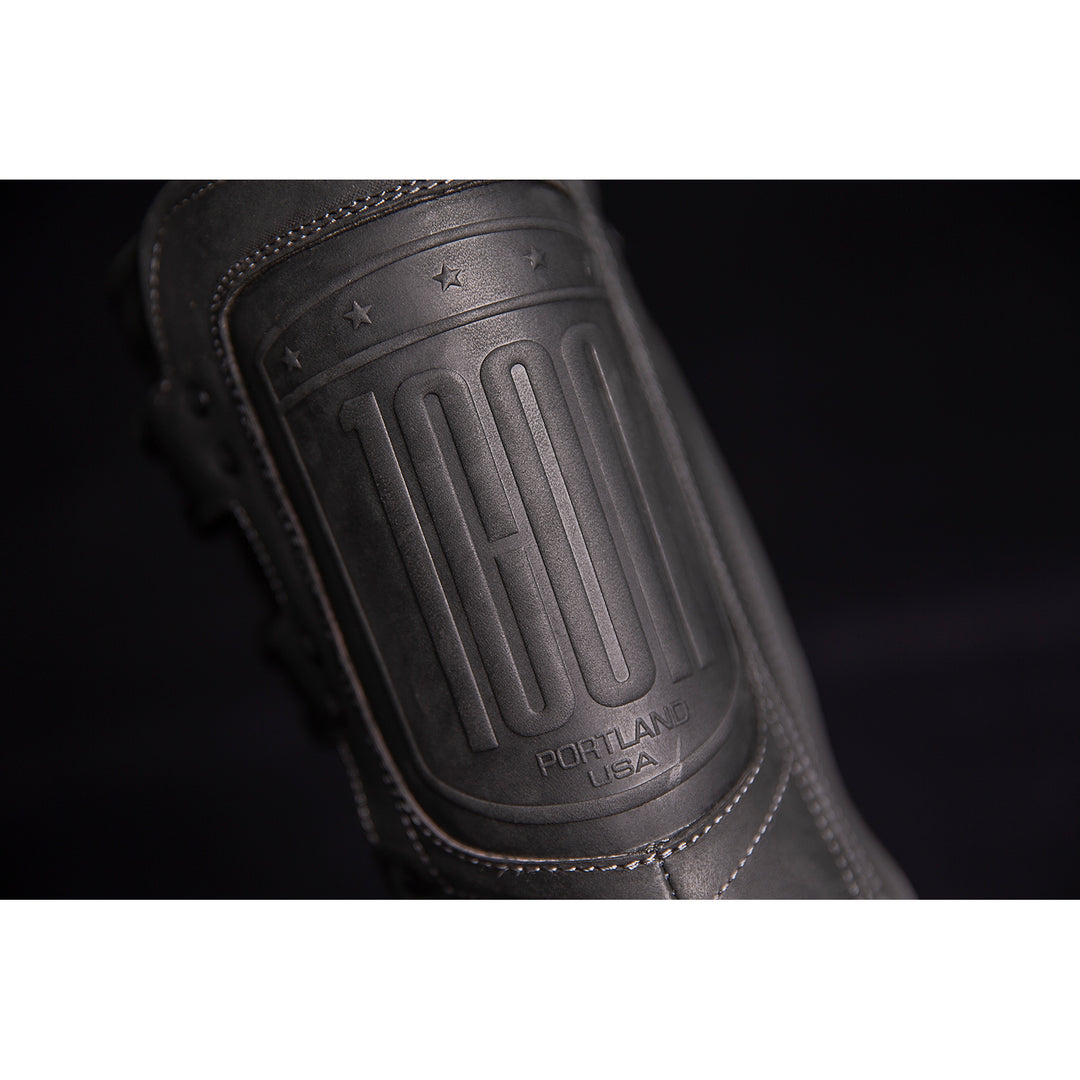 ICON Elsinore 2™ Boots Black - Close-Up of Front Calf Logo