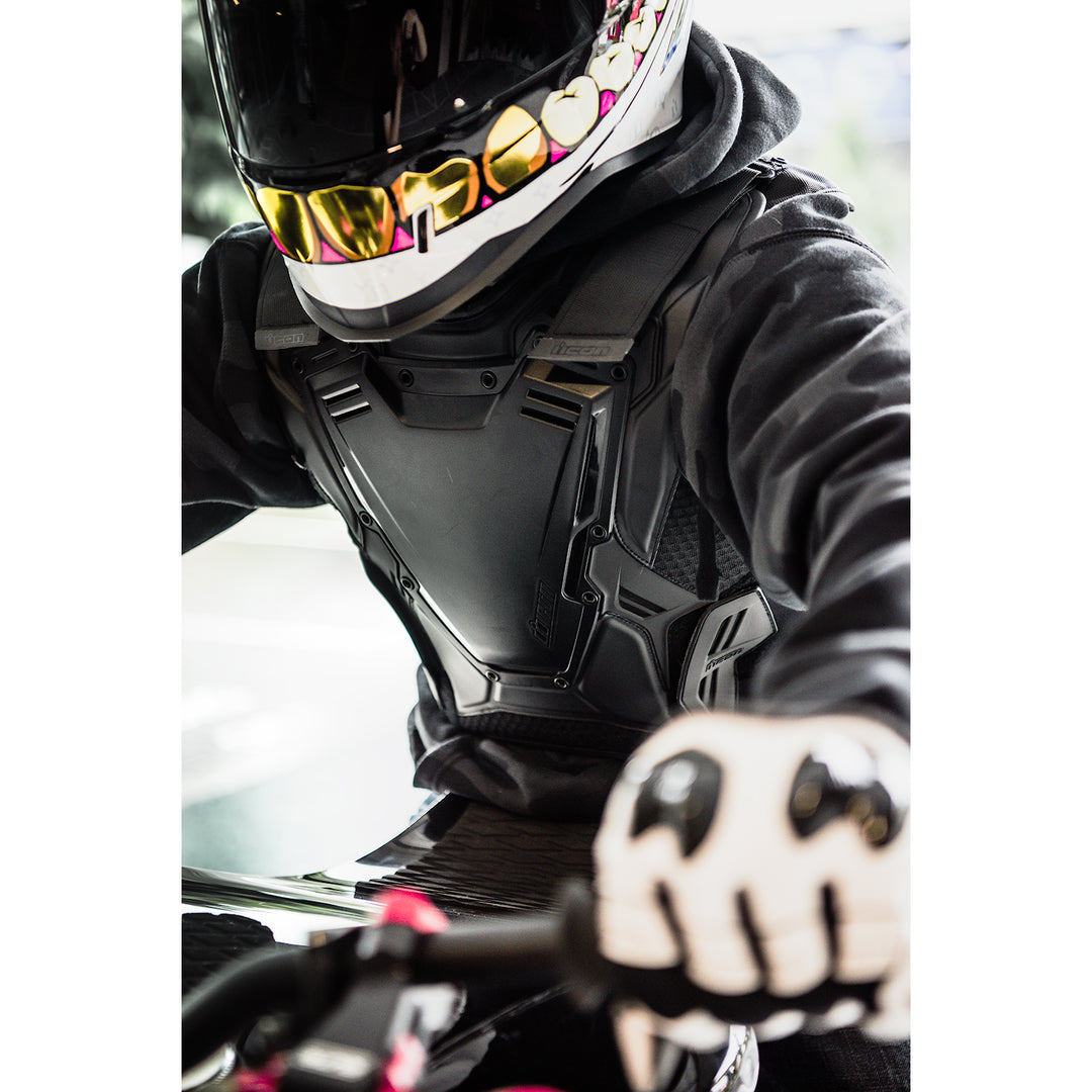 ICON Field Armor 3™ Vest Stealth - Lifestyle Angled Close-Up of Rider Wearing Vest
