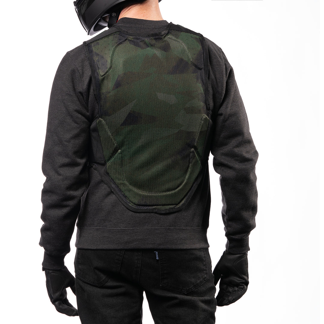 ICON Field Armor Softcore™ Vest Green Camo - Rear View of Model Posing in Vest