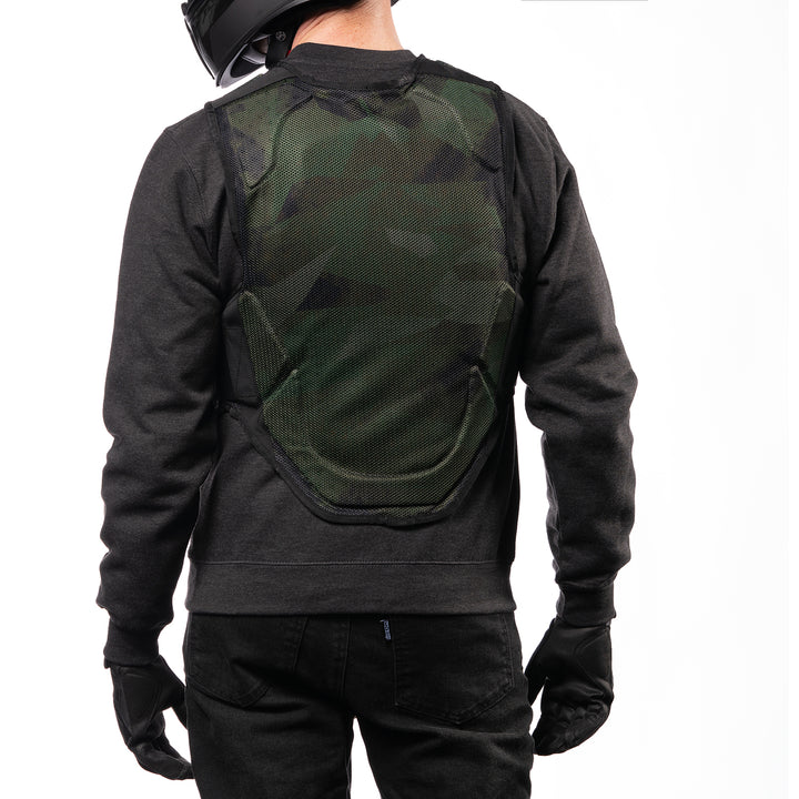 ICON Field Armor Softcore™ Vest Green Camo - Rear View of Model Posing in Vest