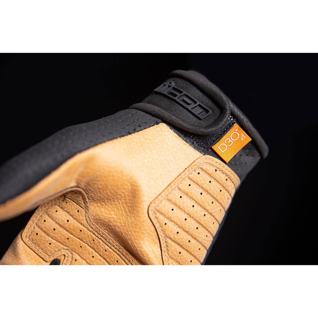 ICON Airform™ Gloves Black/Tan - Close-up of Wrist Strap and D3O Tag